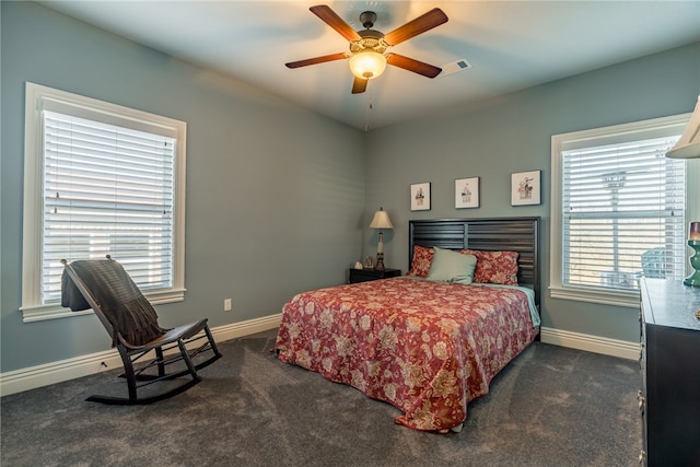 1374 Javello Rd, Tontitown, AR 72762 - bedroom featuring ceiling fan, dark carpet, and multiple windows
