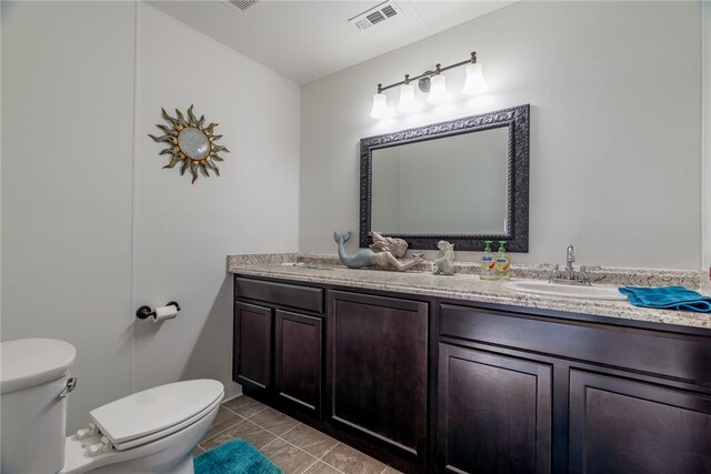 1374 Javello Rd, Tontitown, AR 72762 - bathroom with double sink vanity, tile floors, and toilet