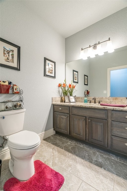 1374 Javello Rd, Tontitown, AR 72762 - bathroom featuring tile floors, toilet, and vanity