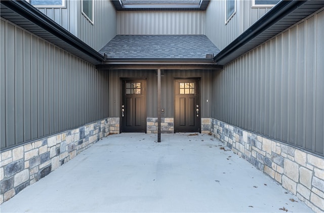 doorway to property with a patio area