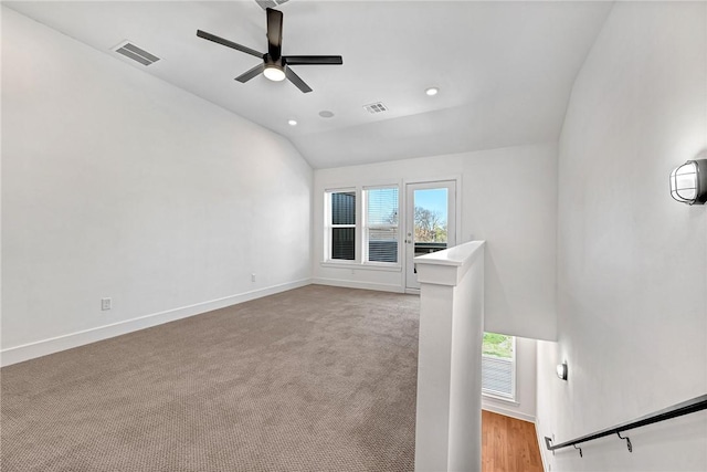 unfurnished room with visible vents, plenty of natural light, and baseboards