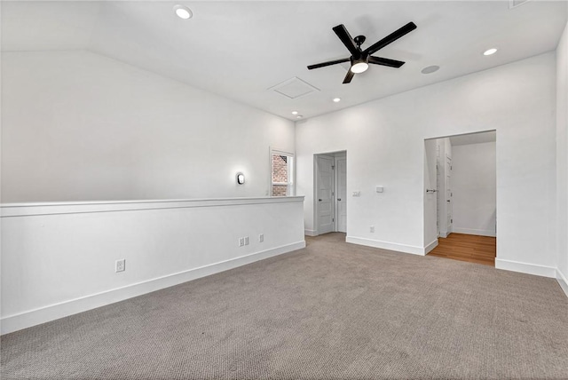 unfurnished bedroom with recessed lighting, baseboards, carpet floors, and attic access