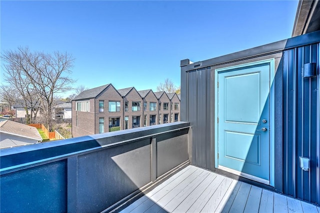 balcony featuring a residential view