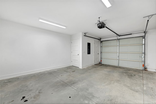 garage featuring electric panel and a garage door opener