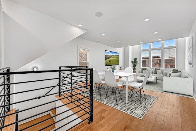 dining room featuring recessed lighting and hardwood / wood-style floors