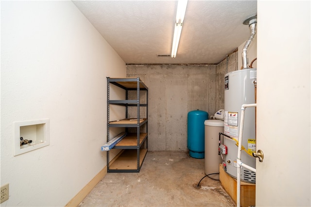 utility room with water heater