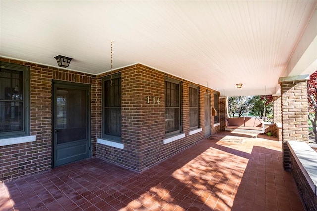 view of patio featuring covered porch