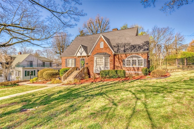 tudor house with a front yard