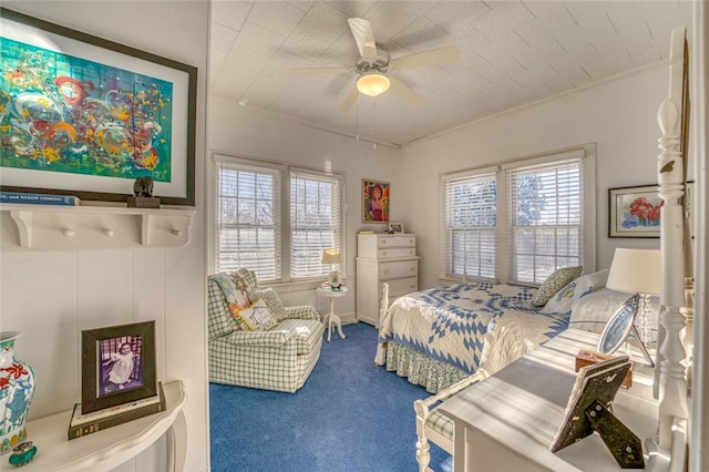 bedroom featuring dark carpet and ceiling fan