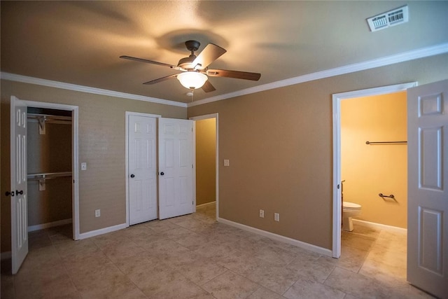 2449 Brophy Cir, Fayetteville, AR 72703 - unfurnished bedroom featuring ceiling fan, connected bathroom, ornamental molding, and light tile floors