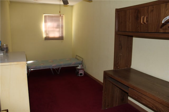 unfurnished bedroom featuring ceiling fan