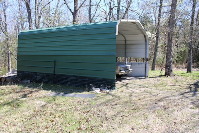 view of outdoor structure with a carport