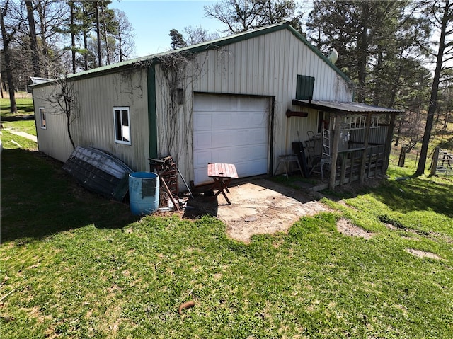 garage with a yard