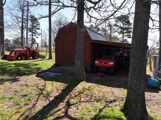 view of outdoor structure with a carport