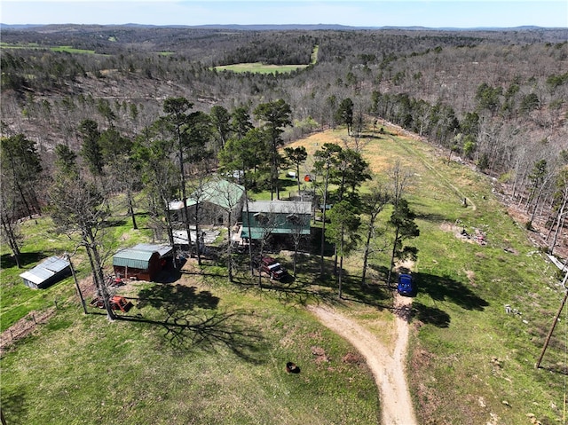 birds eye view of property with a rural view