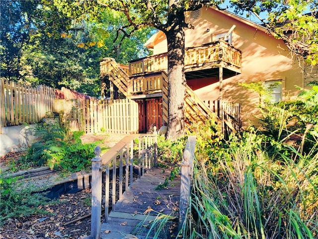 exterior space featuring a wooden deck