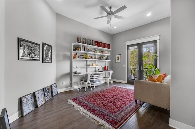 office space with french doors, dark wood-type flooring, and ceiling fan