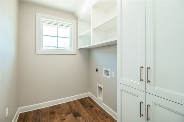 washroom with dark hardwood / wood-style flooring, hookup for an electric dryer, and hookup for a washing machine