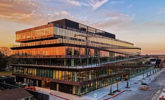 view of outdoor building at dusk