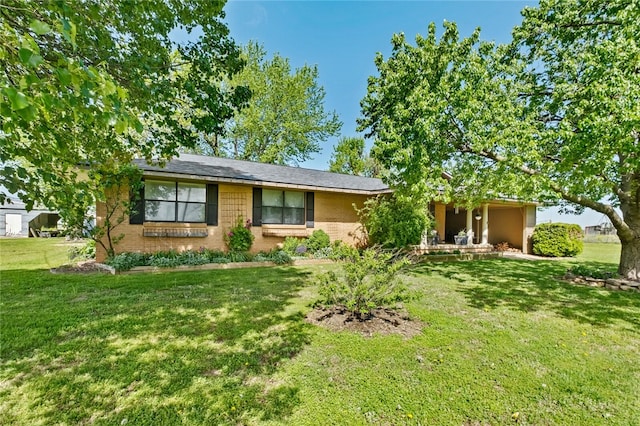 ranch-style house with a front lawn