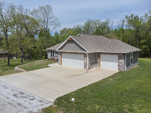 view of front facade featuring a garage and a front yard