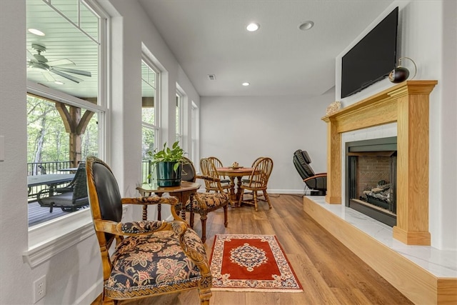 living area with hardwood / wood-style flooring