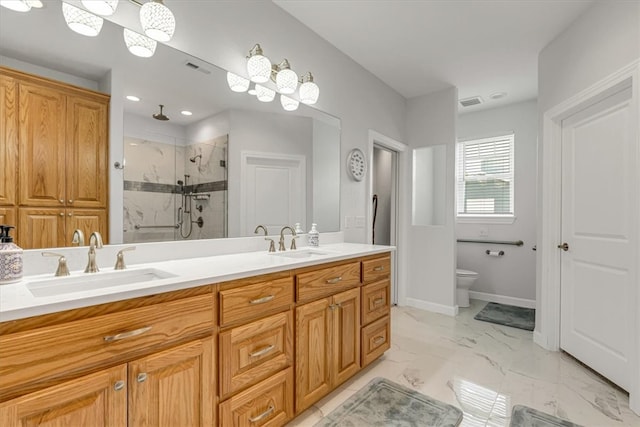 bathroom featuring tile floors, an enclosed shower, toilet, and dual bowl vanity