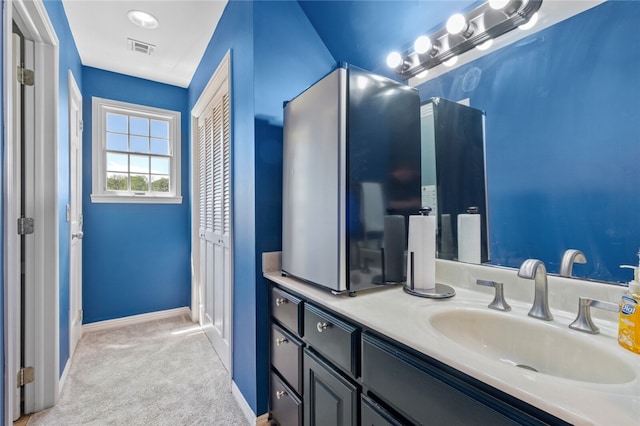 bathroom featuring large vanity