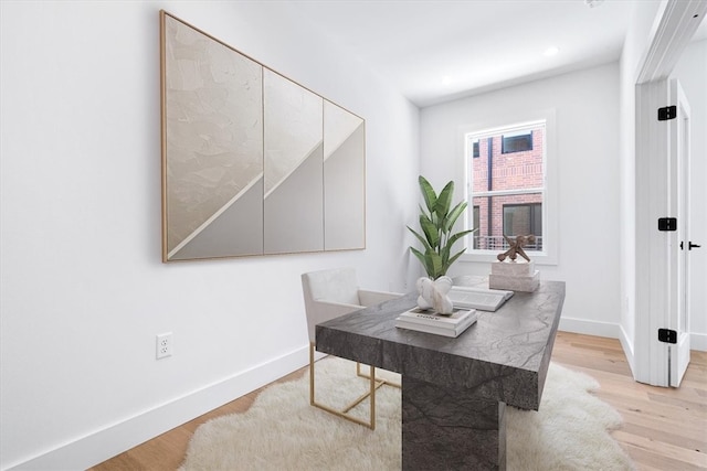 dining room with light wood-type flooring