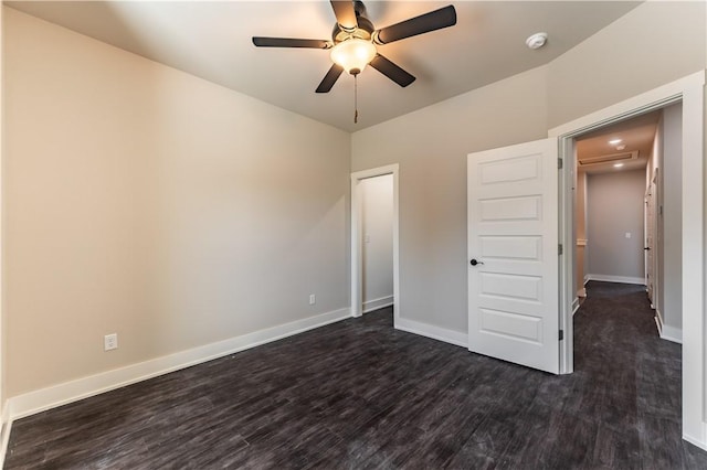 unfurnished bedroom with dark wood-type flooring and ceiling fan