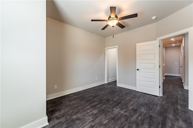 unfurnished bedroom with dark wood-type flooring and ceiling fan