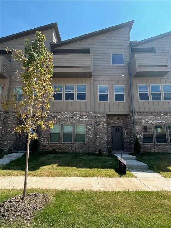 exterior space with a front lawn