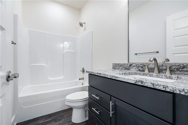 full bathroom featuring vanity, toilet, shower / bathing tub combination, and hardwood / wood-style flooring