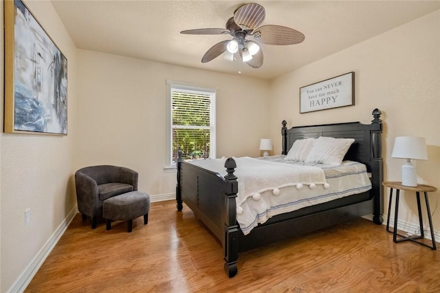 bedroom featuring ceiling fan and light wood-type flooring