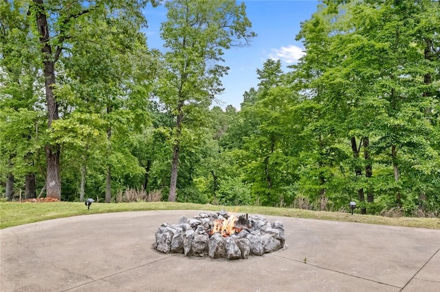 view of patio featuring a fire pit