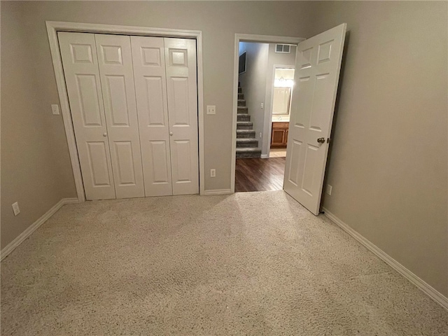 unfurnished bedroom featuring a closet