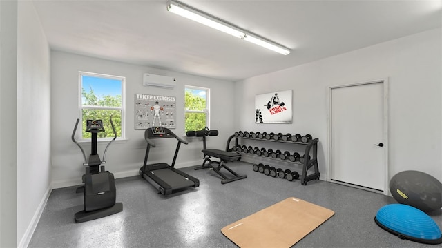 exercise room with a wall mounted air conditioner