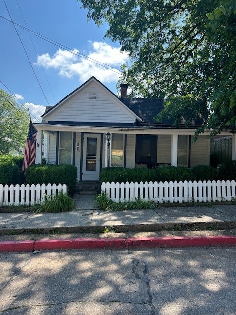 bungalow-style house featuring covered porch