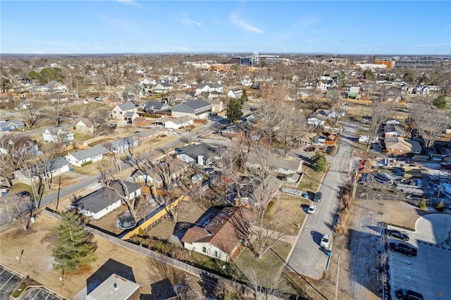 birds eye view of property with a residential view