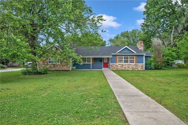 ranch-style house with a front lawn