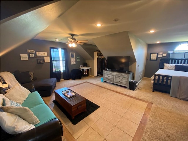 carpeted living room with lofted ceiling and ceiling fan