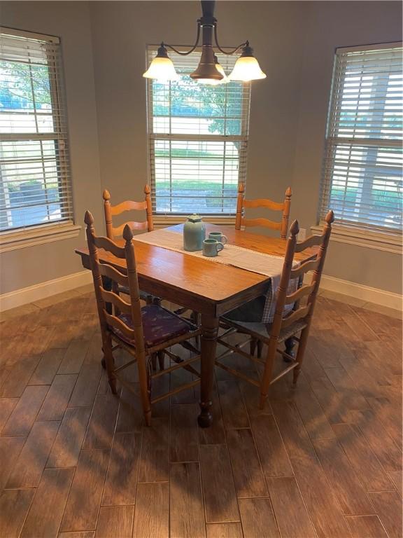 dining room featuring dark hardwood / wood-style flooring