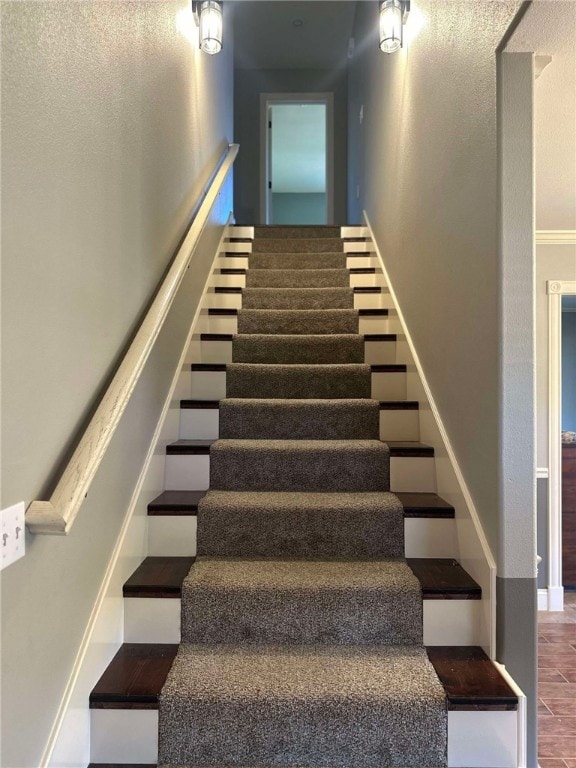 stairway with wood-type flooring