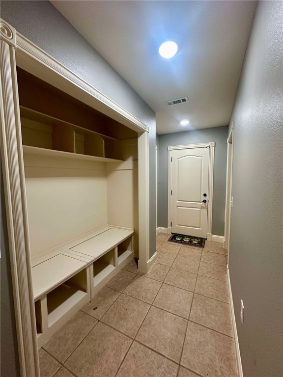 mudroom featuring light tile patterned floors