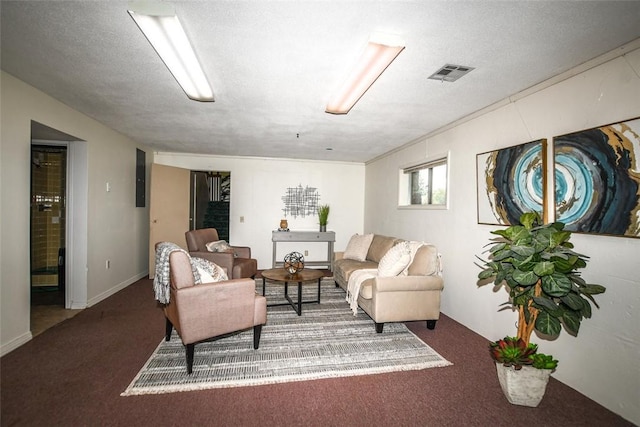 carpeted living room featuring a textured ceiling and visible vents