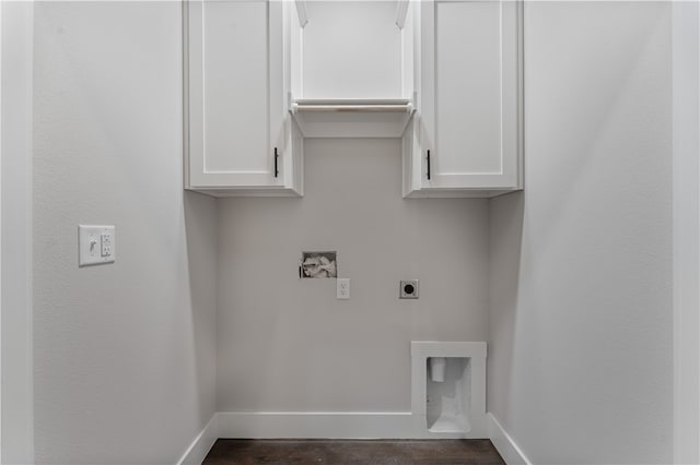 laundry room with electric dryer hookup, washer hookup, and cabinets