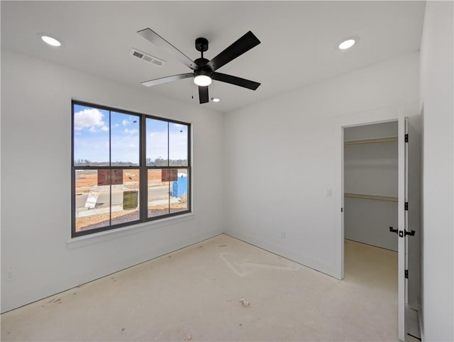 unfurnished room with ceiling fan