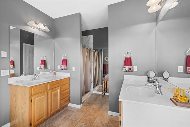 bathroom featuring dual bowl vanity and tile flooring