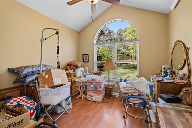 office with ceiling fan, hardwood / wood-style flooring, and lofted ceiling