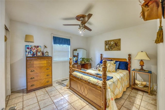 bedroom with light tile patterned floors and ceiling fan